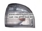 Clear front park light assembly with gray trim for Toyota Lite Ace CR27 Replacement corner parking light for Toyota Lite Ace CR27 Lotto model Front view of white Toyota Lite Ace CR27 van with corner park lights Left and right front park light set for Toyota Lite Ace CR27Aftermarket clear clearance lamp for Toyota Lite Ace van front corner